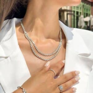 model wearing a double row diamond necklace and diamond bracelet by el galla