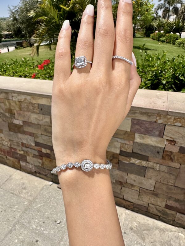 Model wearing white gold diamond wedding band by El Galla