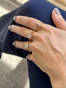 Elegant rose gold ring featuring a single center diamond