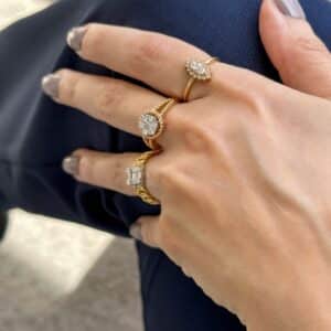 Elegant rose gold ring featuring a single center diamond