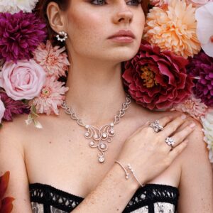 Elegant rose gold open hoop earring featuring seven sparkling diamonds and a latch closure